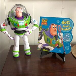 Buzz Lightyear Action Figure 12” and Book Set
VERY gently used Buzz & Book